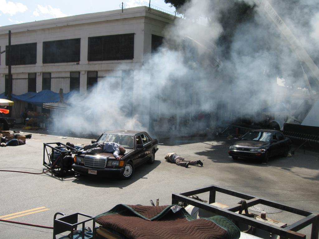 Exploded car hanging in mid air