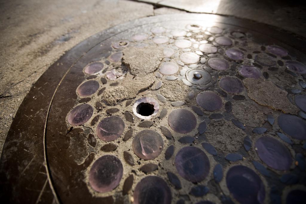Manhole Cover with Purple Glass