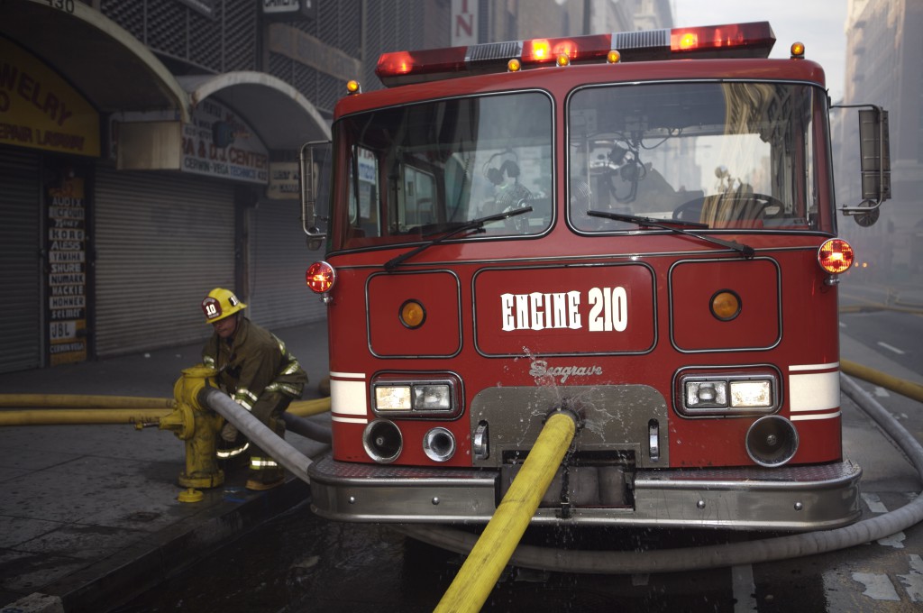Pump Truck 210 and Firefighter