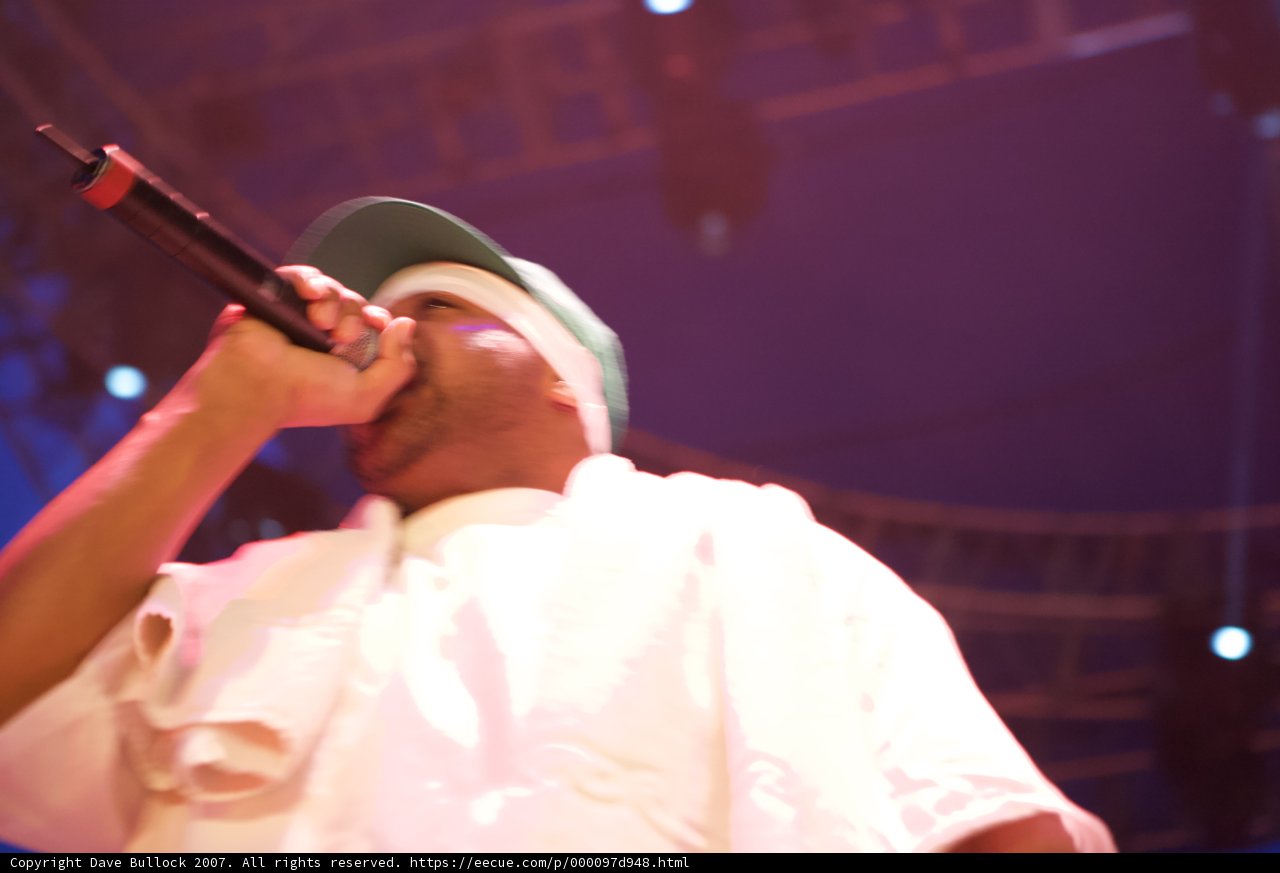 Coachella Concert Performed by Man in Green Hat and White Shirt