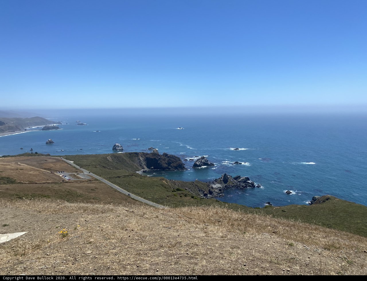 Overlooking the Serene Ocean from the Top of the Hill