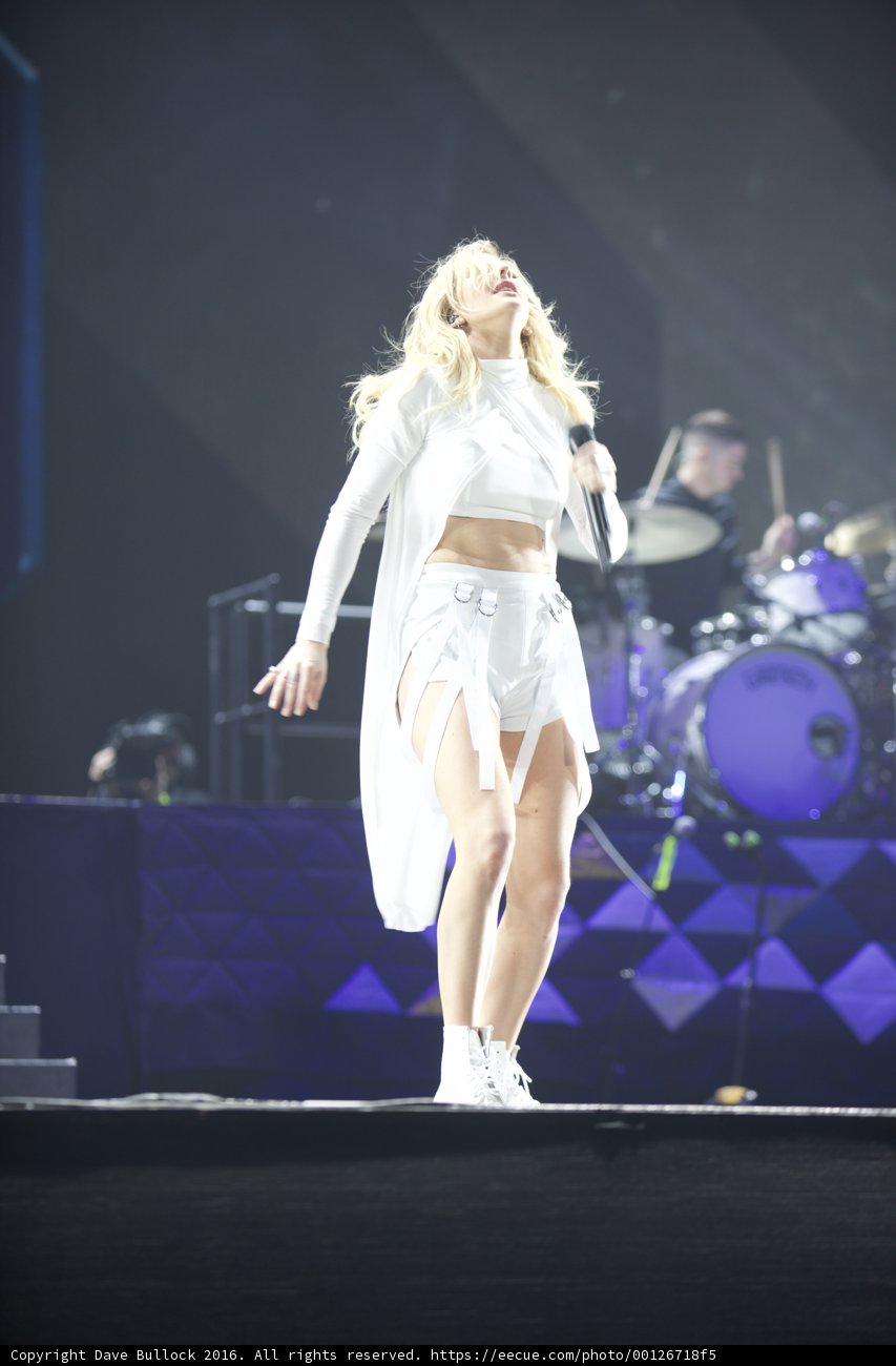 Solo Performance in White: A Woman Takes the Stage