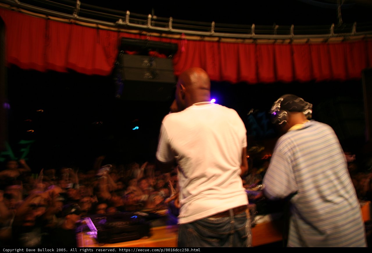 Two Men Performing on Club Stage