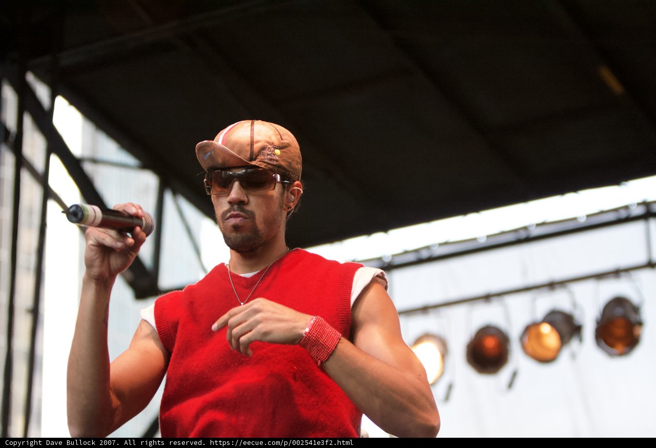 Red Shirted Entertainer Takes the Stage
