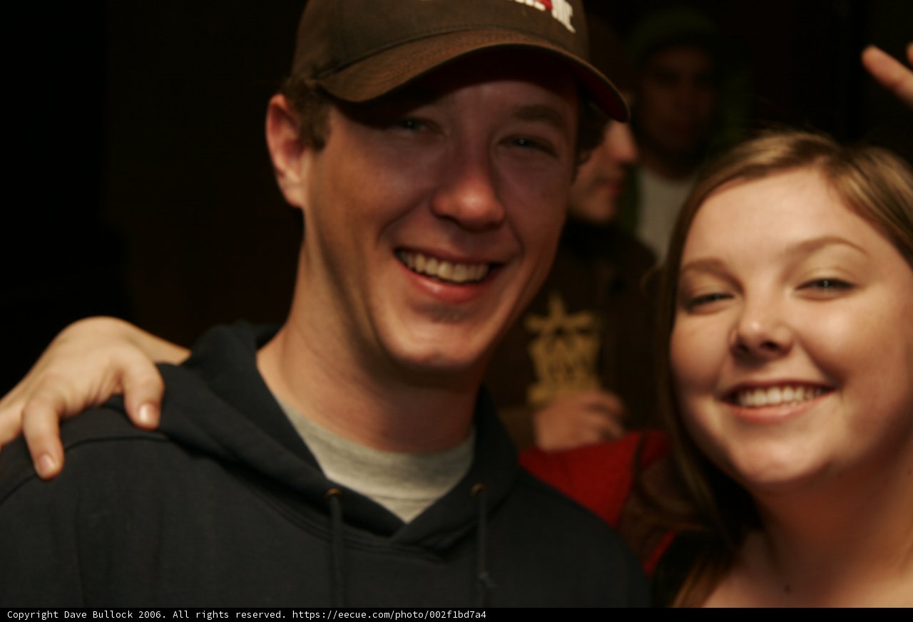 A Happy Couple with Baseball Caps