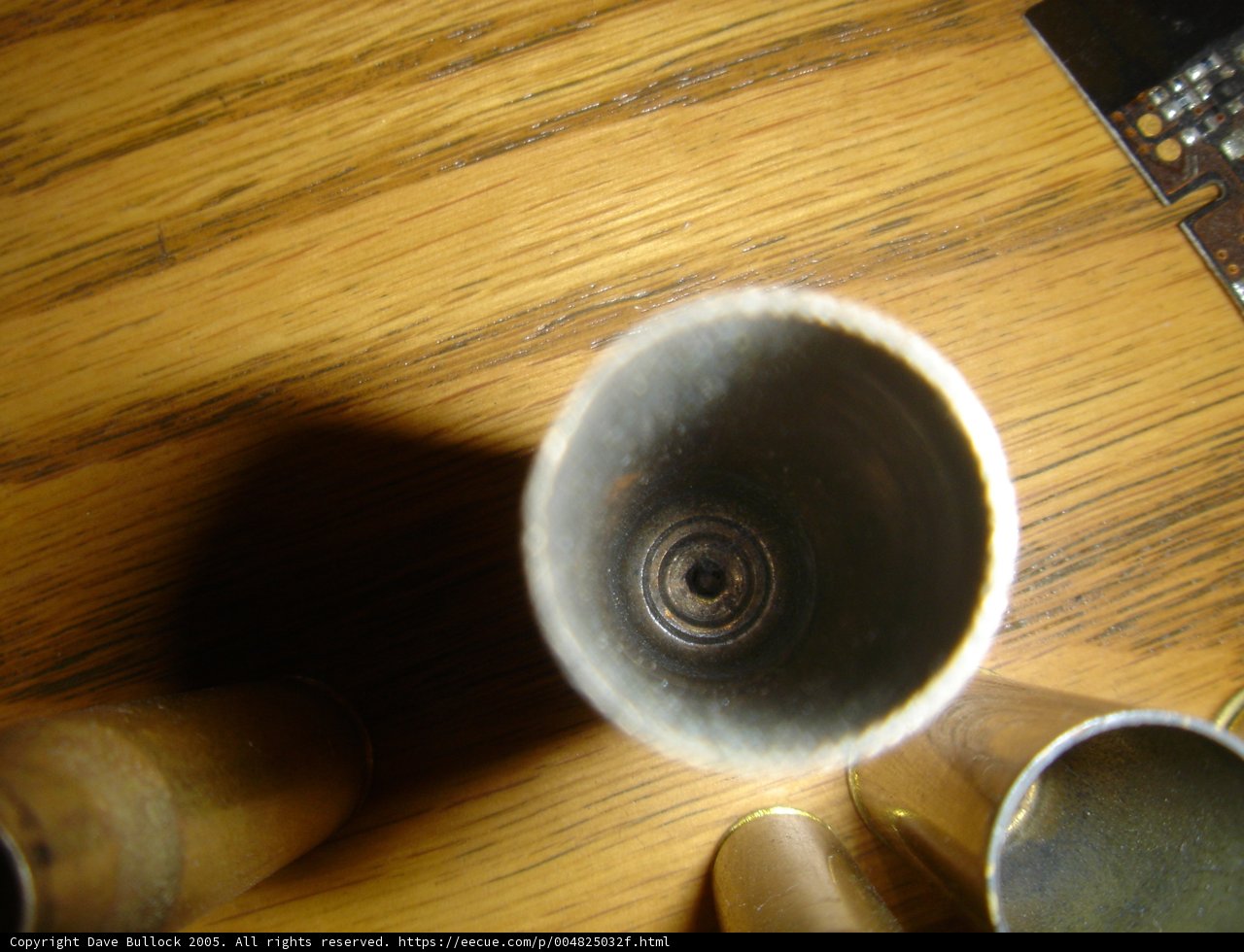 Metal Object on Hardwood Table