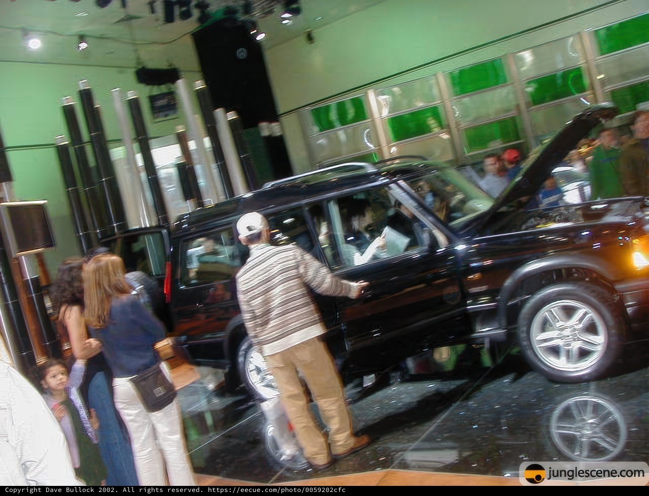 Black SUV with Open Hood at LA Auto Show 2002