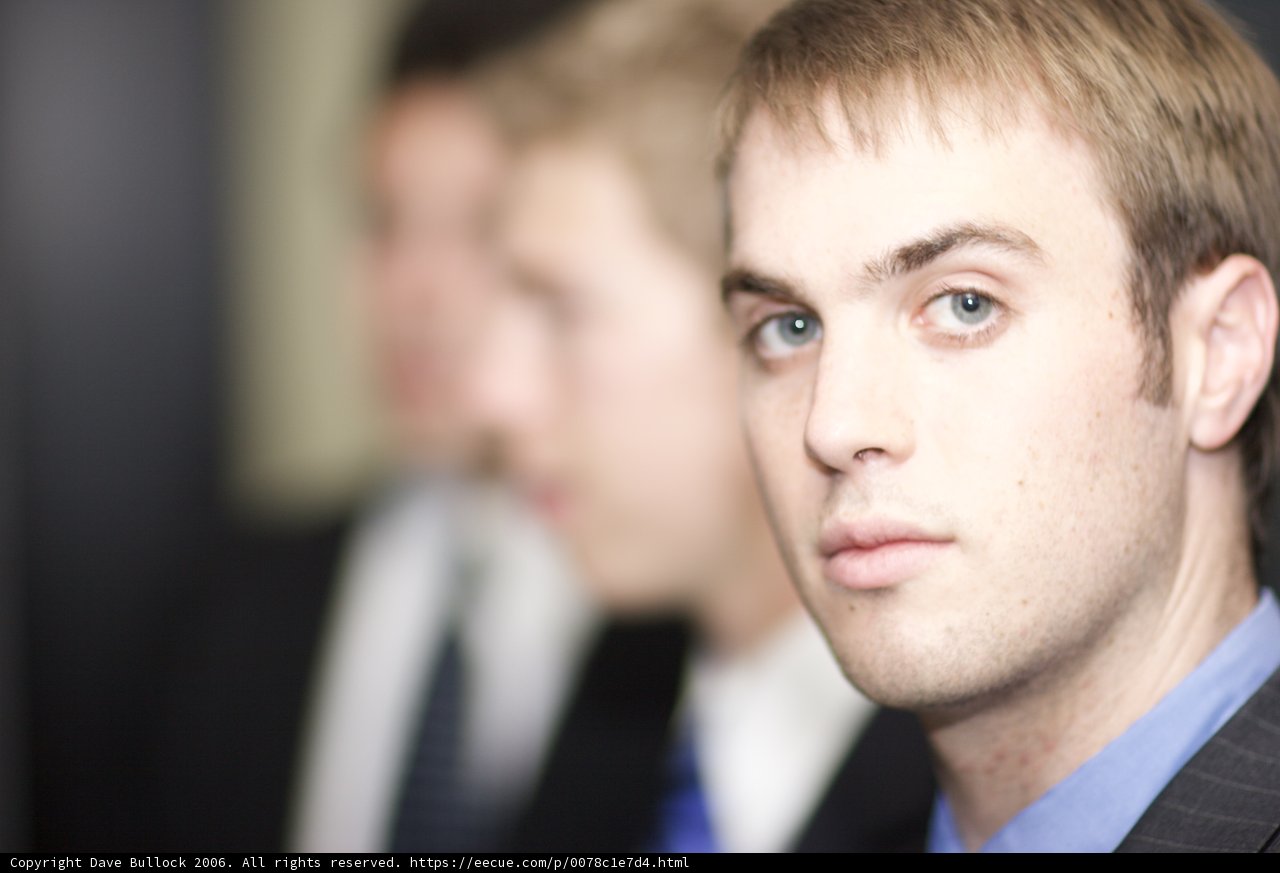 Blue-Shirted Man in Formal Wear