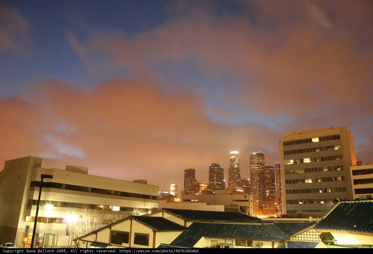 Cityscape under a Dramatic Cloudy Sky
