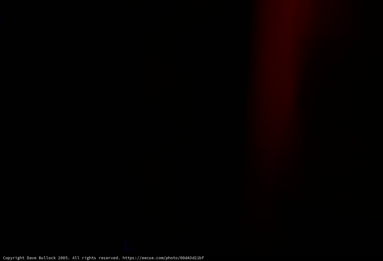Red Spotlight in the Night Sky