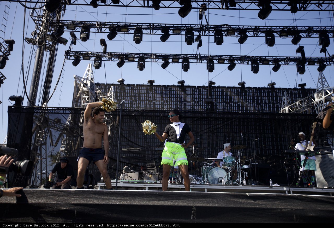 On Stage in Green Shorts