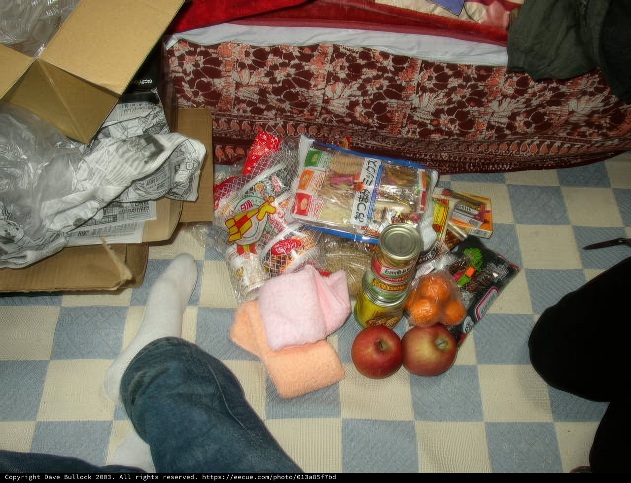 Floor-seated Man with Fruits and Veggies