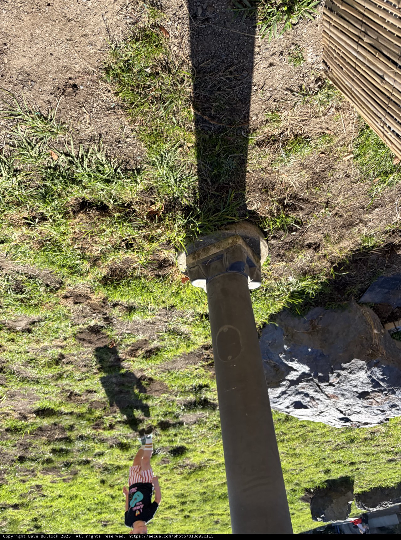 Aerial View of Person Relaxing by Garden Post