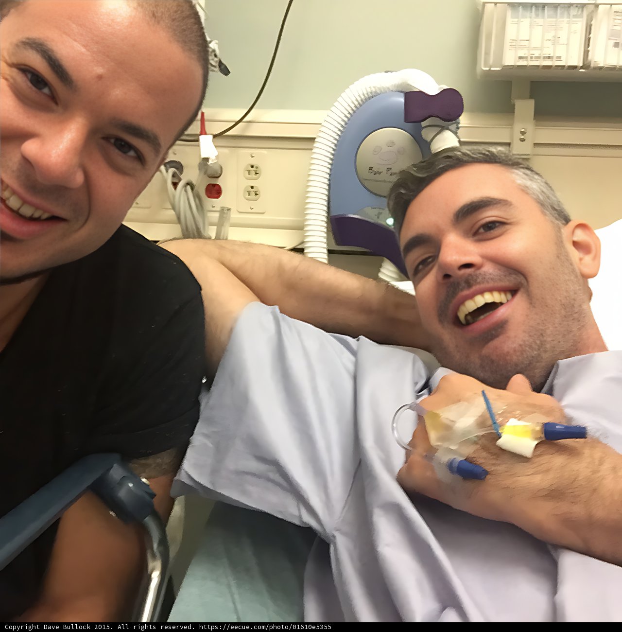 Smiling Patients in Hospital Beds
