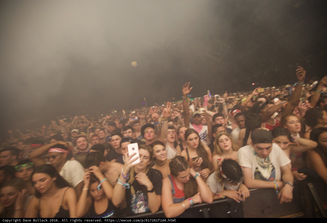 Smoke-filled concert crowd