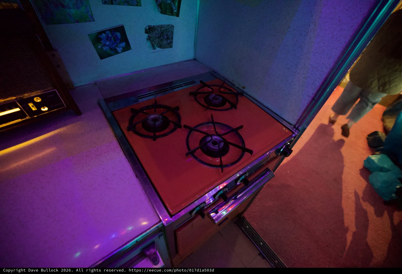 Gas Stove Installation Under Colored Gallery Lighting