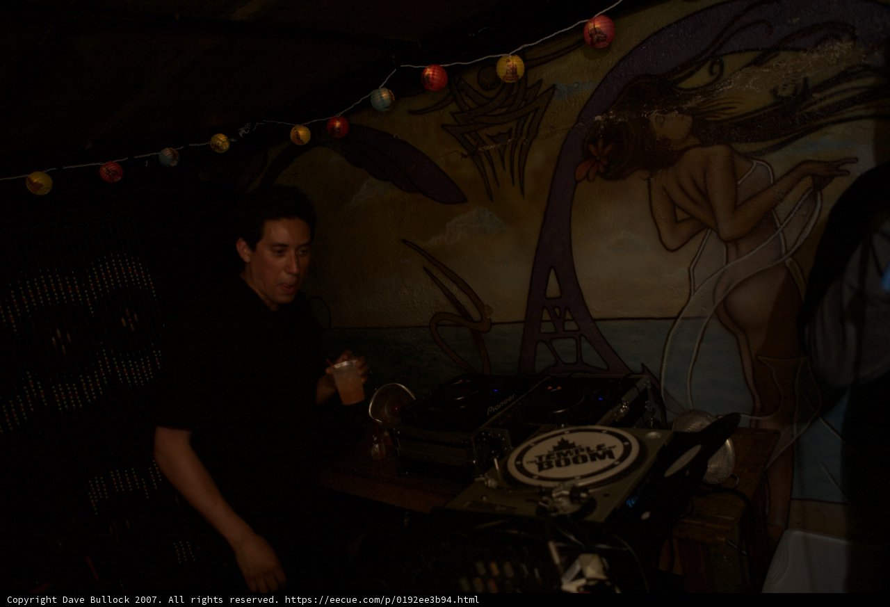 DJ in front of urban art