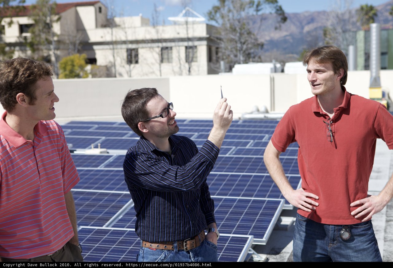 Three Men Harnessing Solar Power