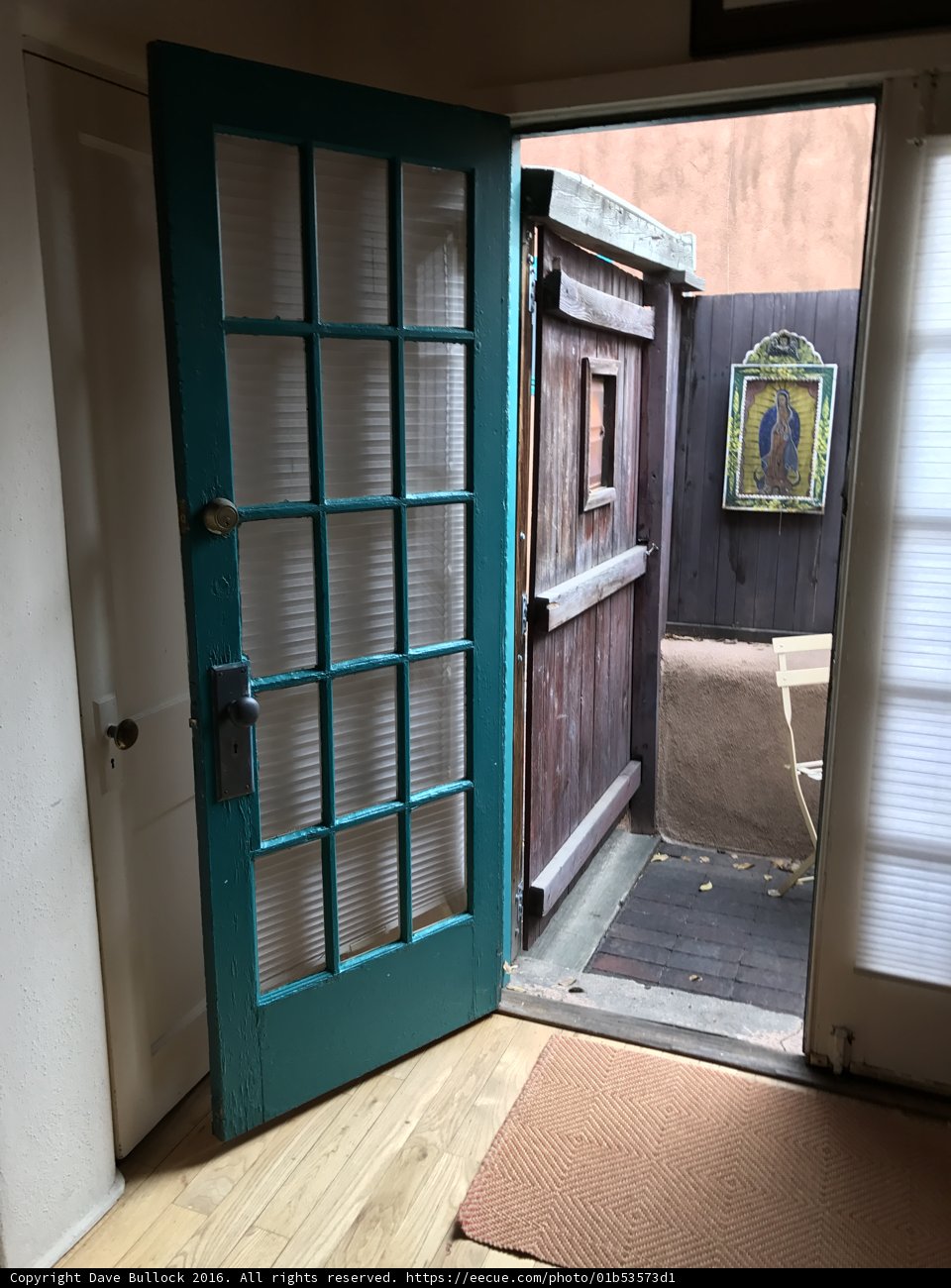 Green Glass and Wooden Door