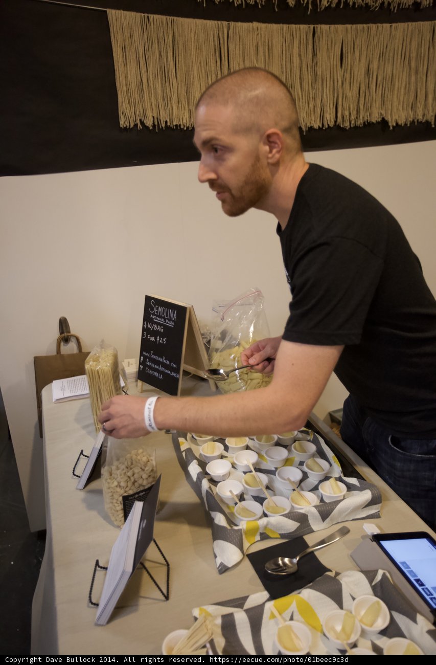 The Man and His Tablet at the Plywood Table