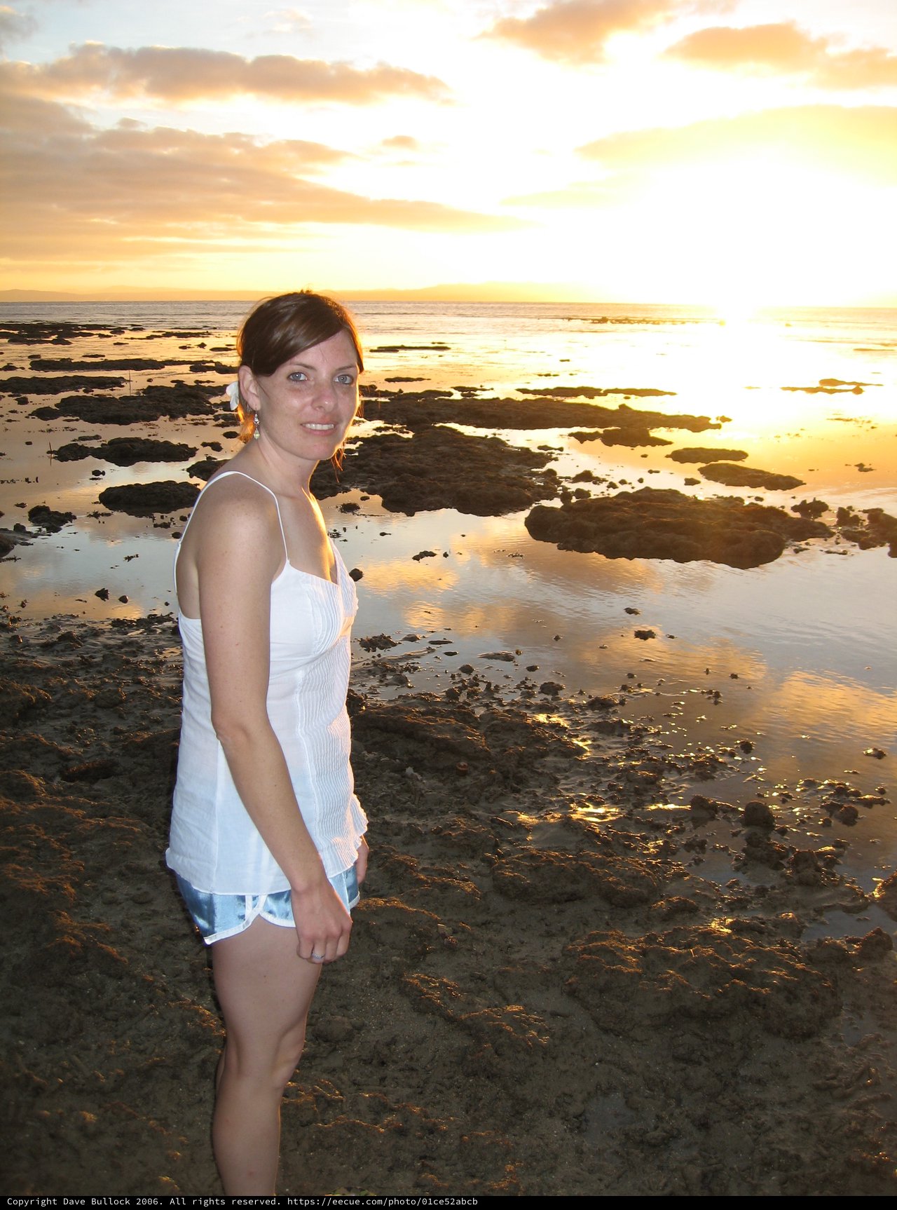 Woman Smiling at Sunset on Fiji Tidal Flats