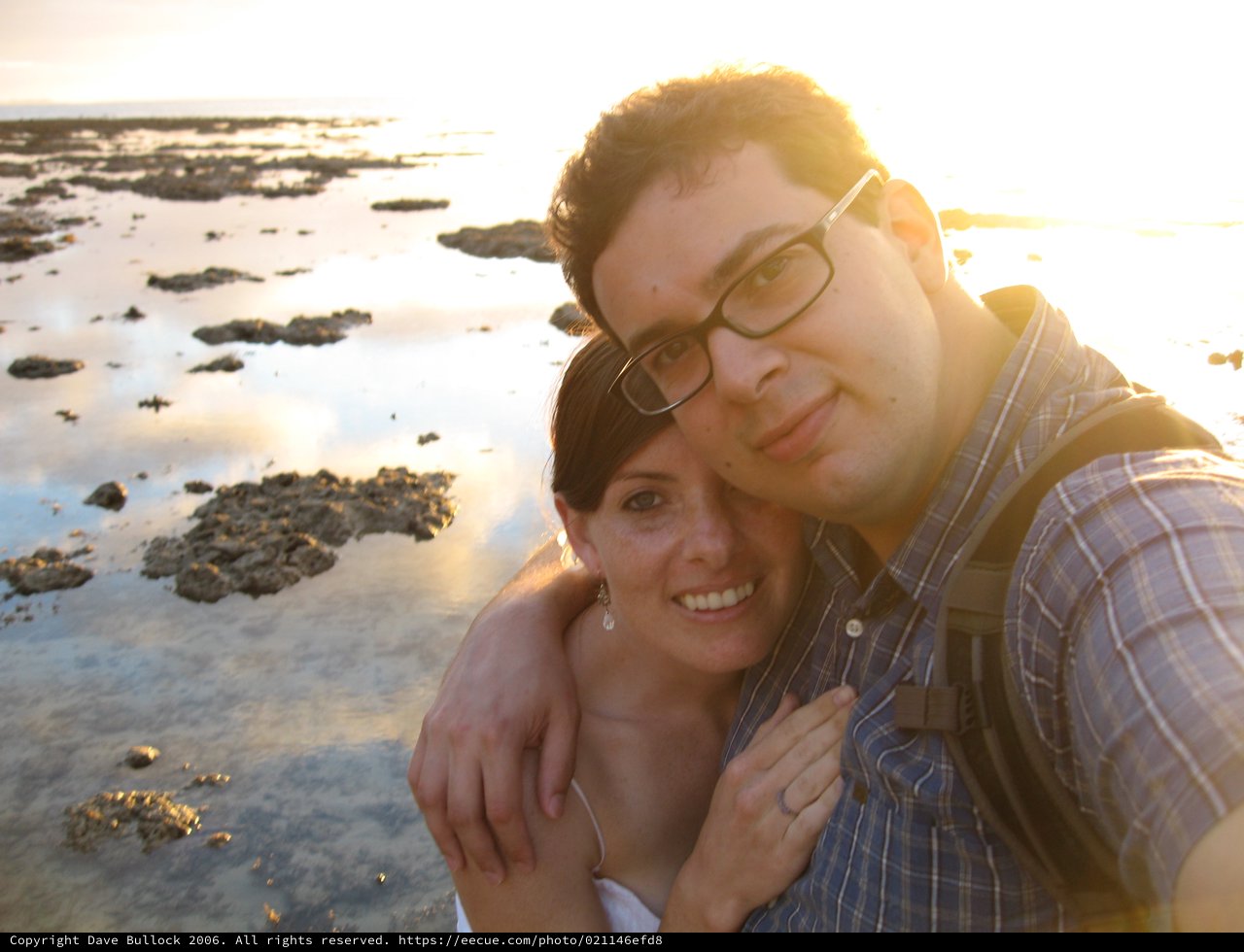 Couple Embracing at Golden Hour on Fiji Reef