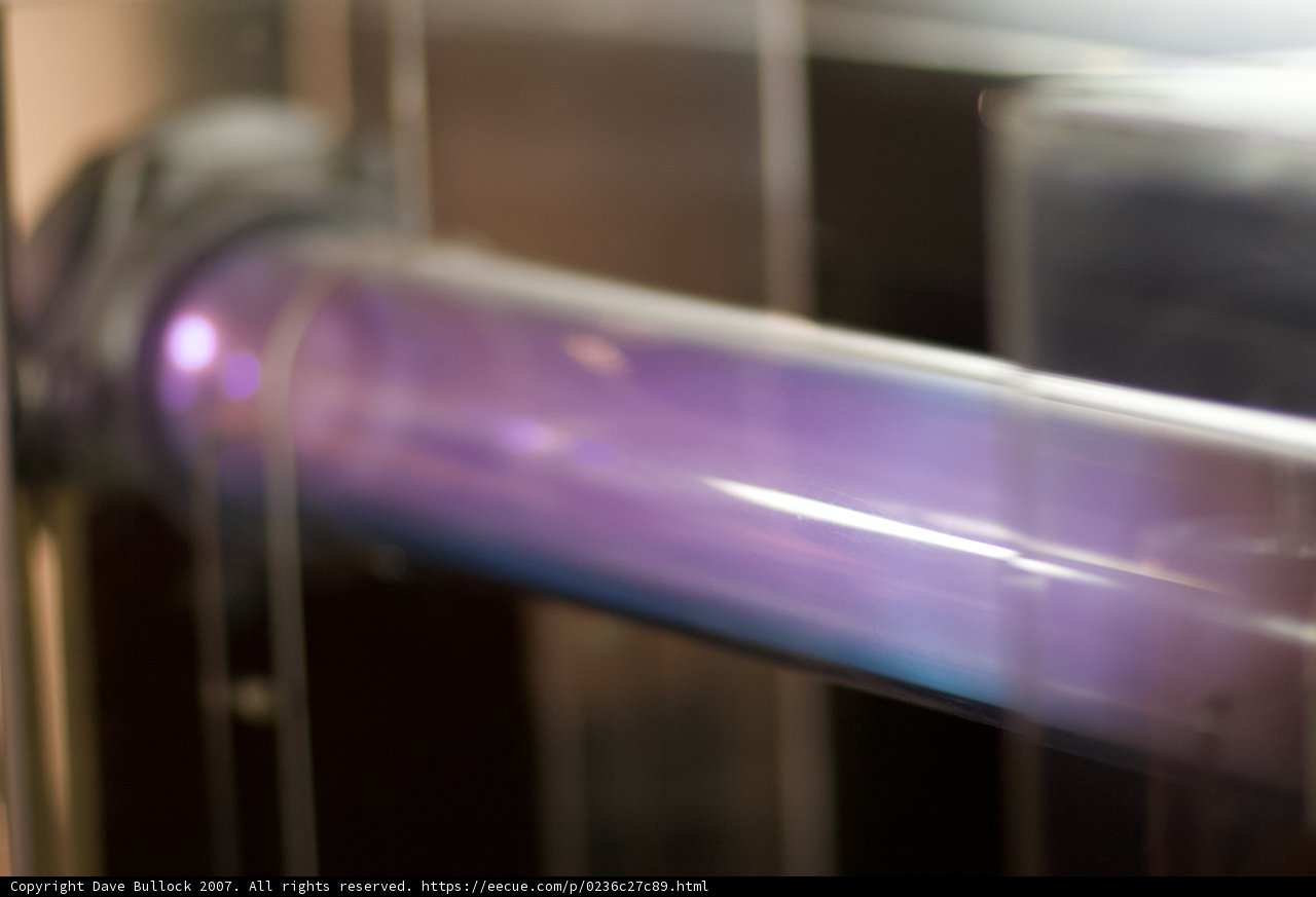 Purple Electrical Device with Light Bulb