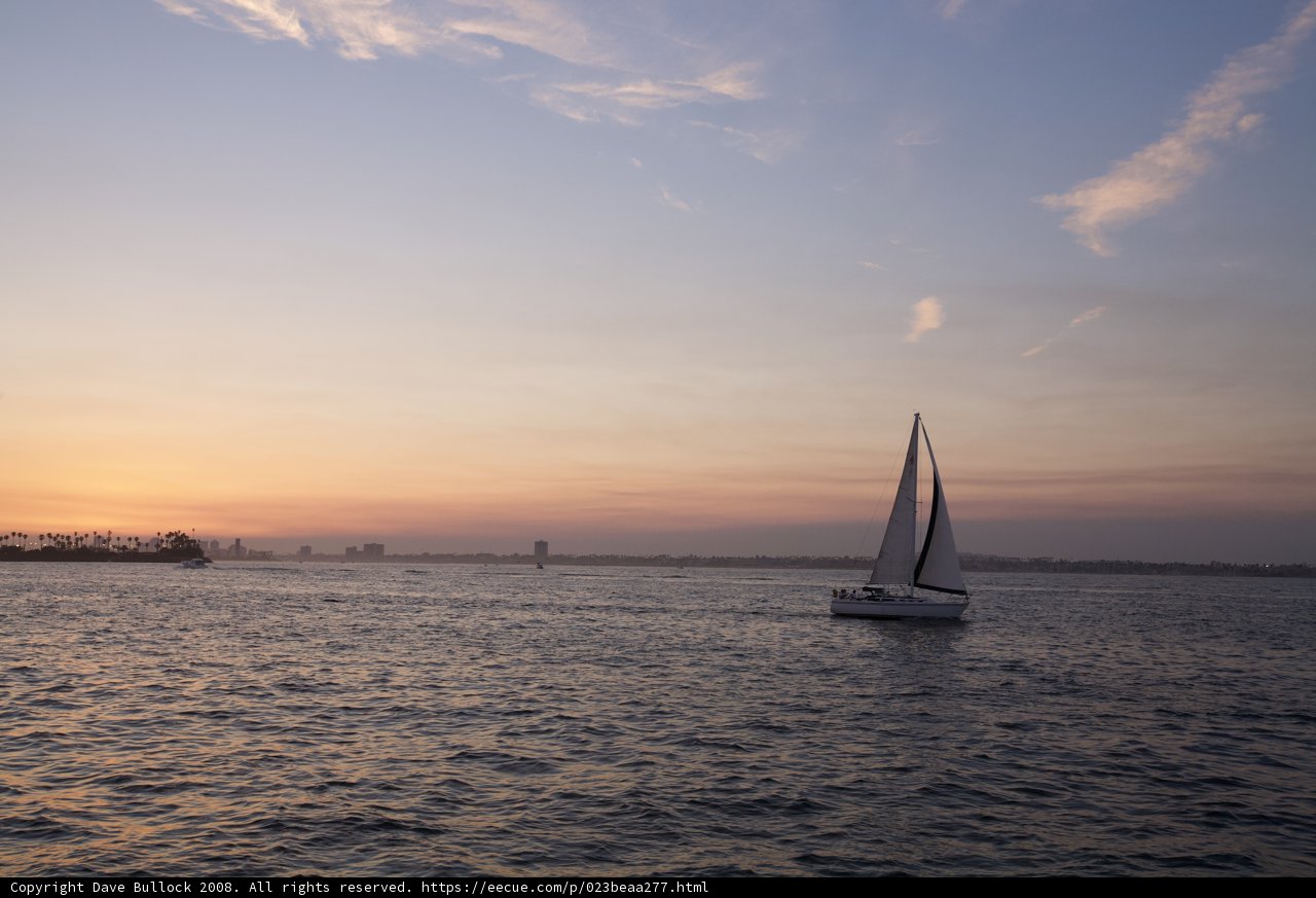 Serene Sailboat at Sunset