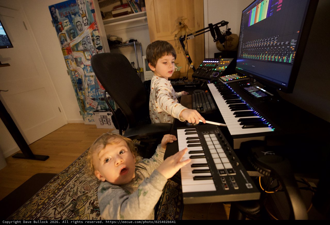 Young Brothers Making Music Together in Home Studio