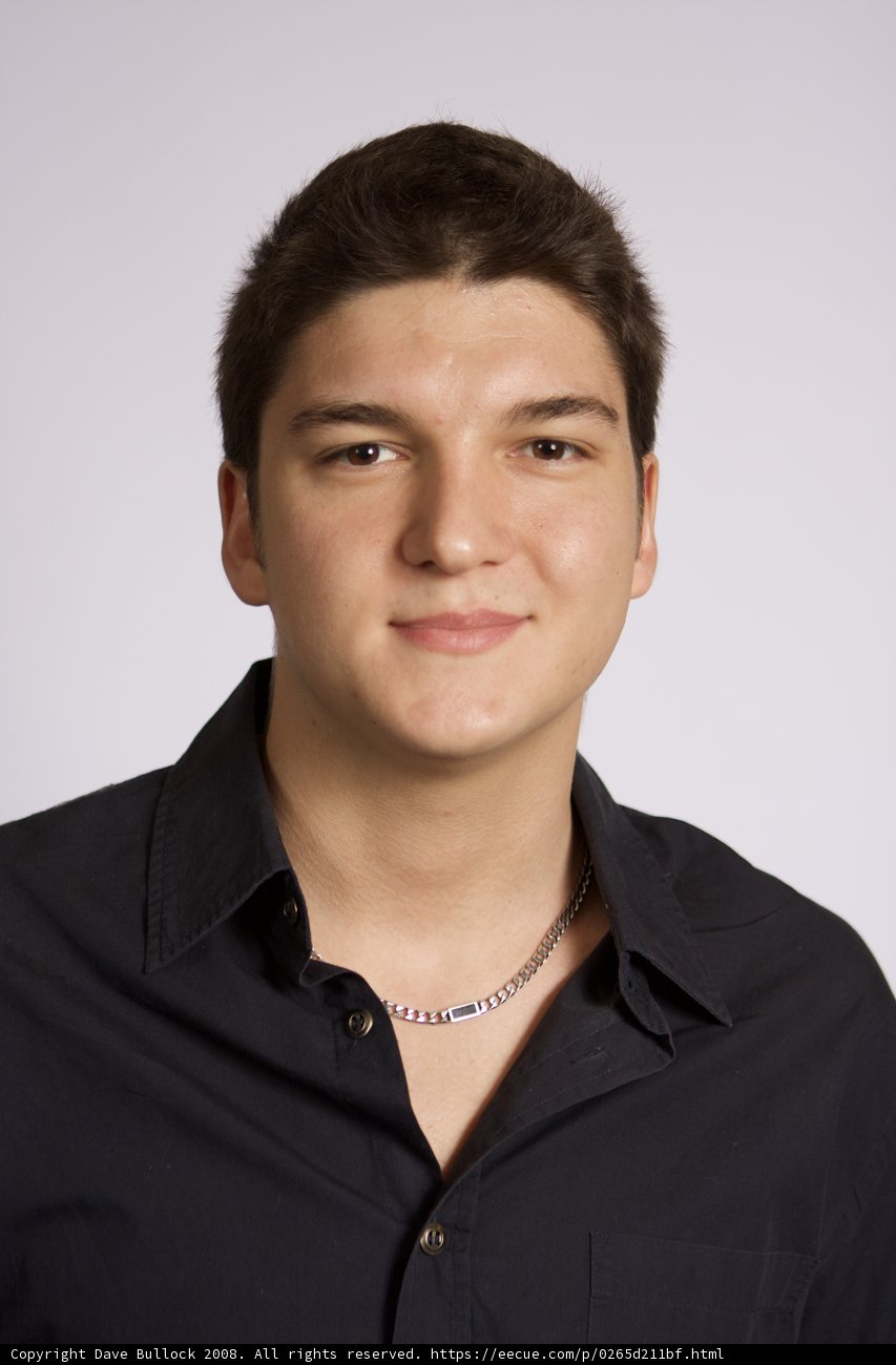 Smiling Man in Black Shirt