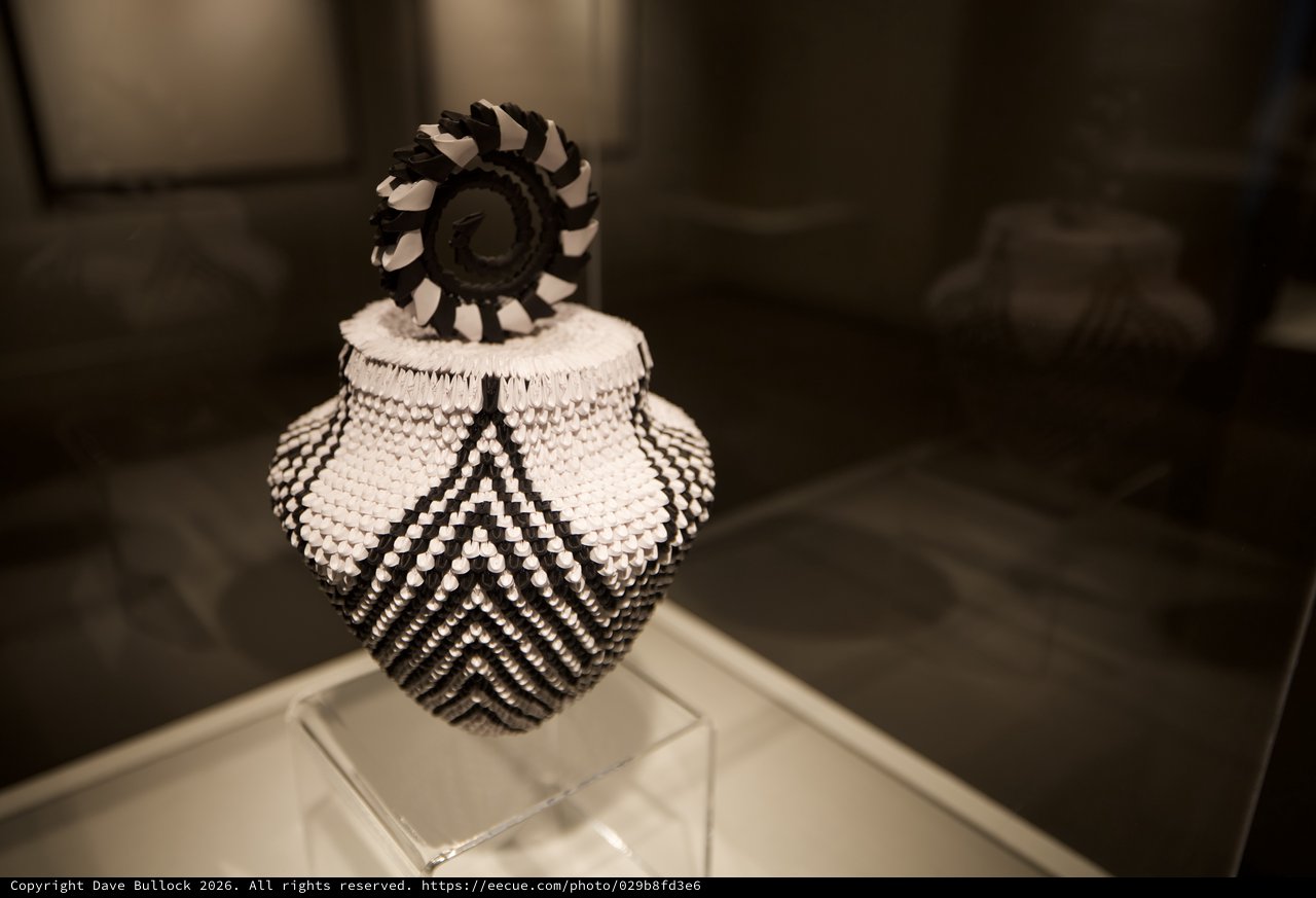 Traditional Native American Beaded Vessel with Geometric Patterns