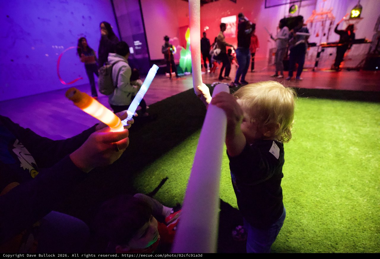 Child with Glow Stick at Baby Rave Event