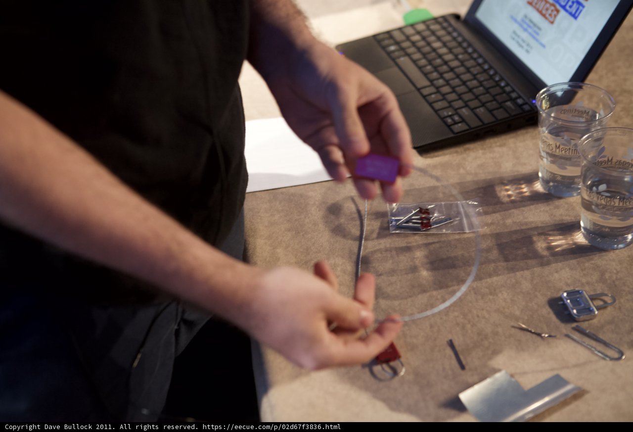 Laptop User with Mysterious Object