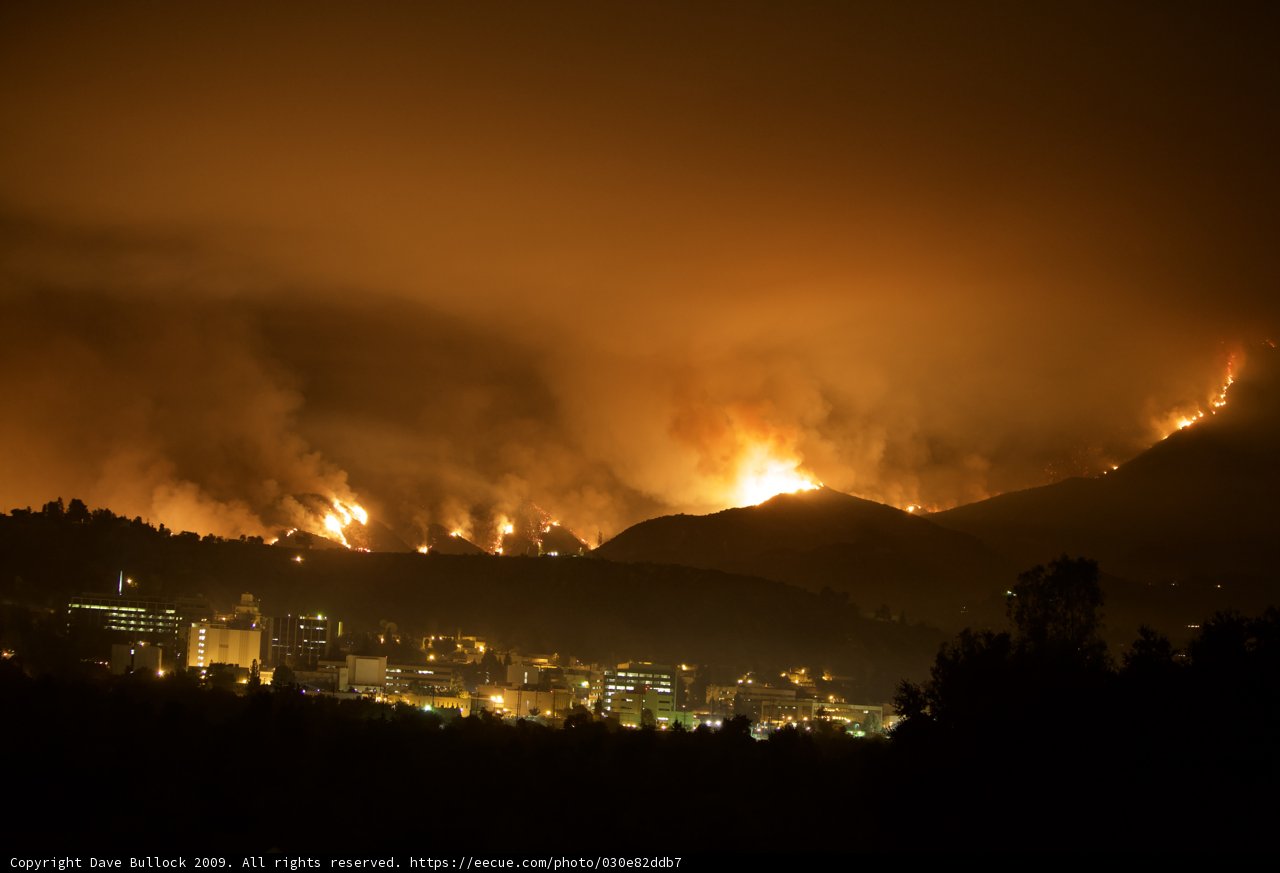 Flames Engulf the Cityscape as Viewed from Atop a Hill During 2009 Station Fire