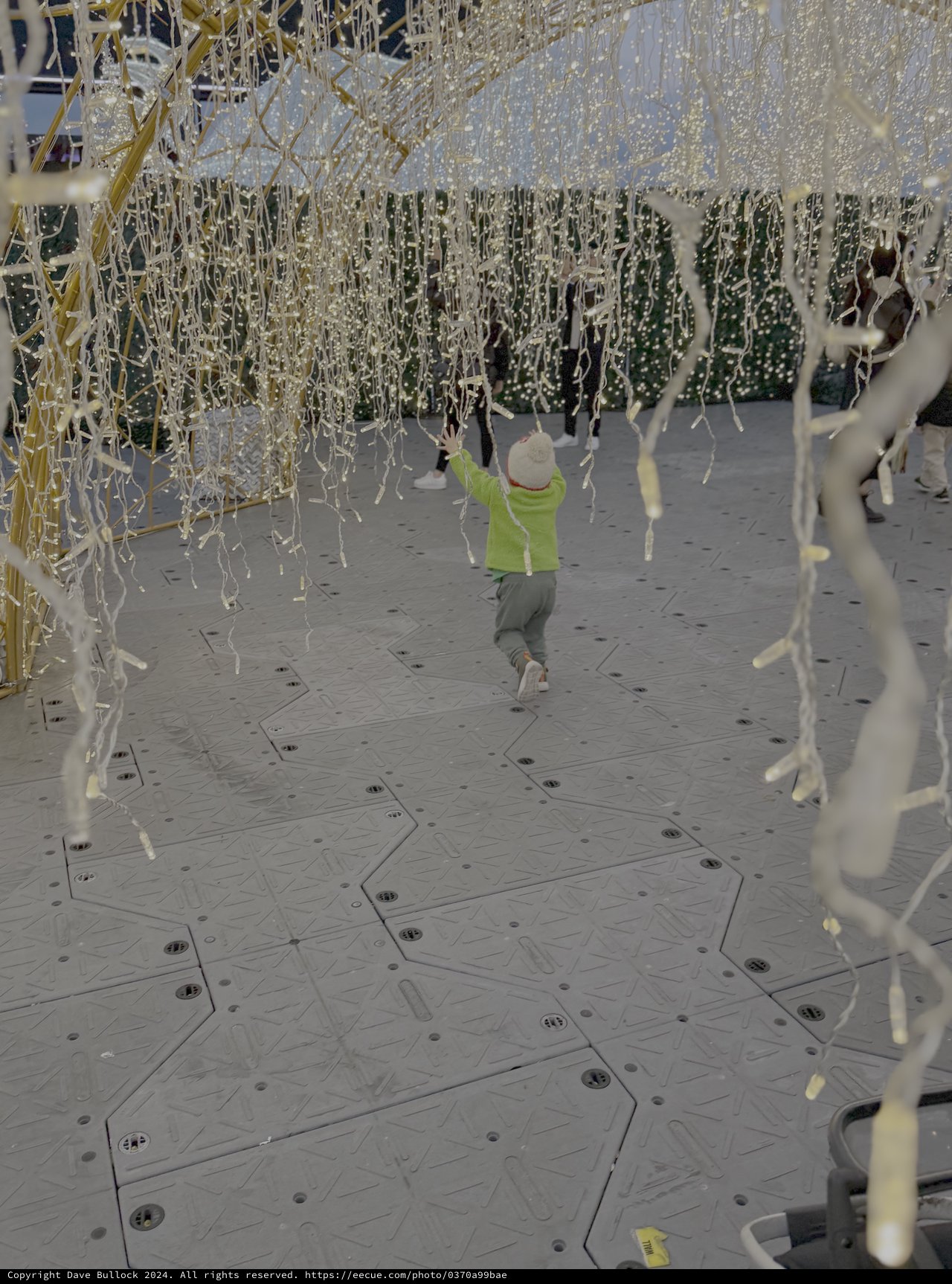 Child Playing in Interactive Art Installation