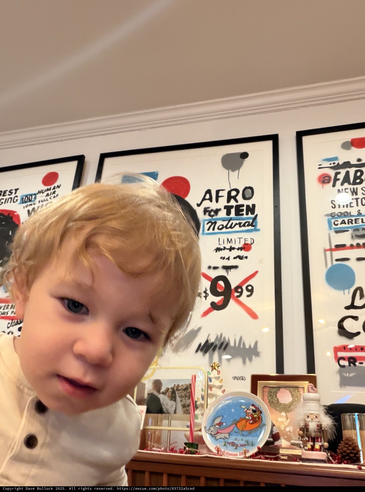 Curious Toddler with Blonde Hair at Home
