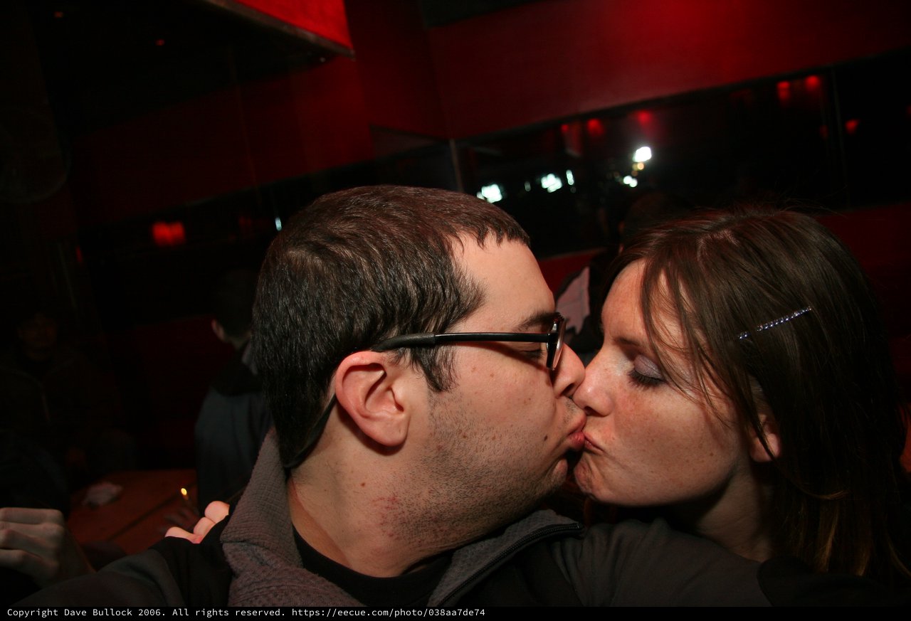 Midnight Kiss at a Dimly Lit Bar