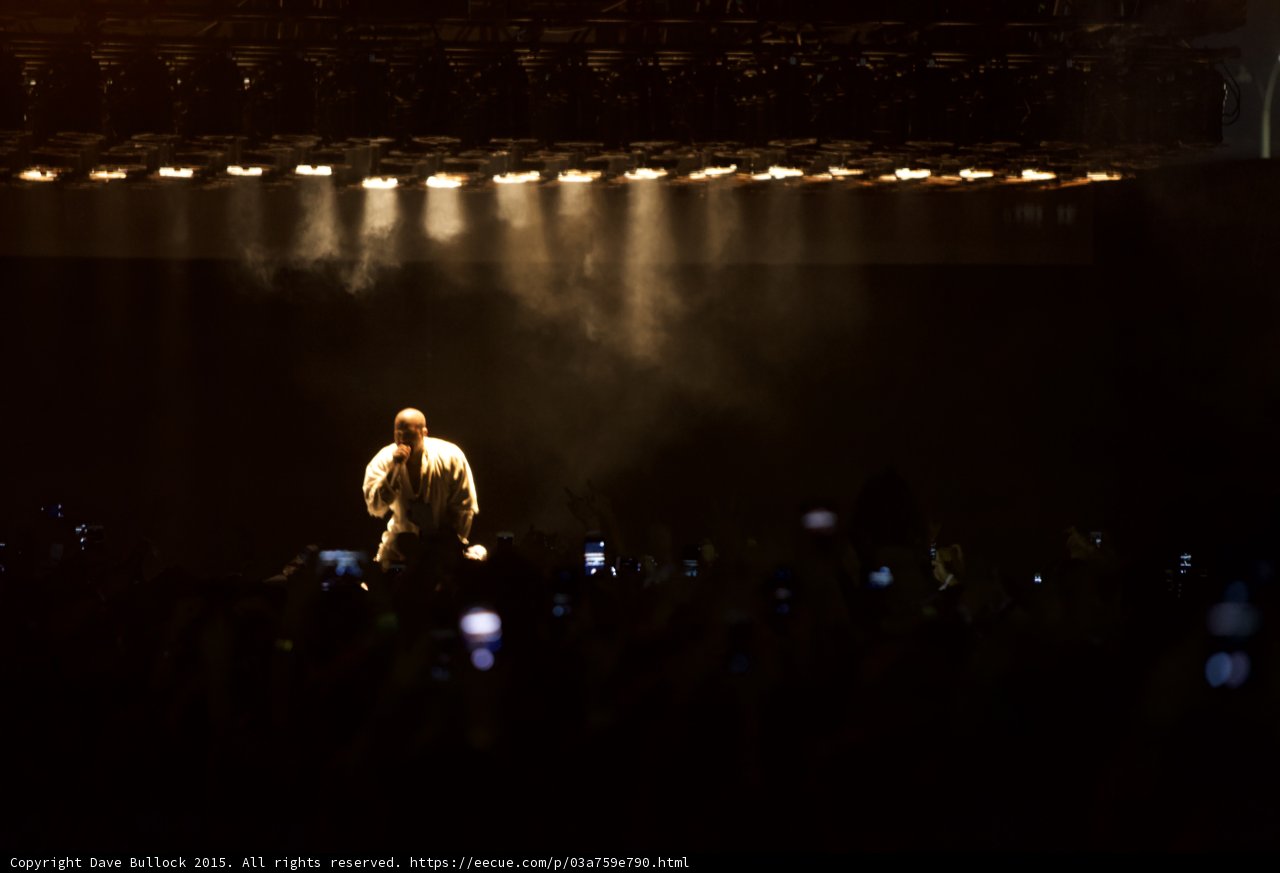 Kanye West Kneeling Spotlight