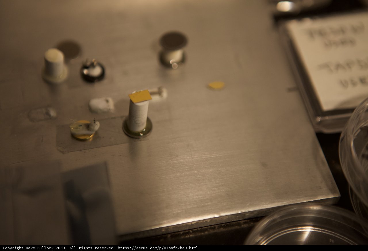 Silver Surface Covered in Mechanical Objects