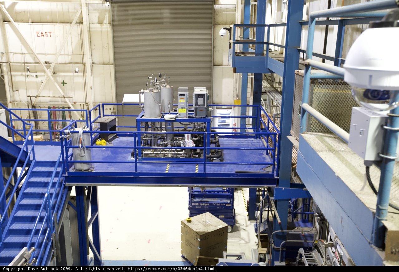 The Blue Staircase Against the Factory Wall
