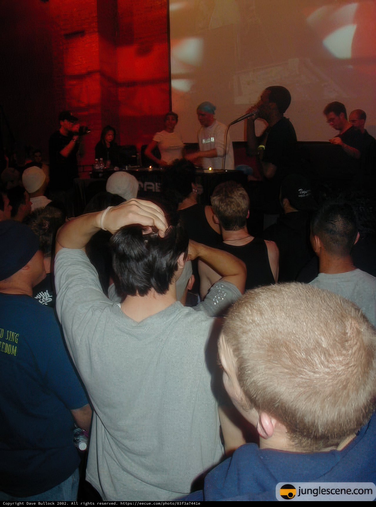 Club-goers watch video at Night Club