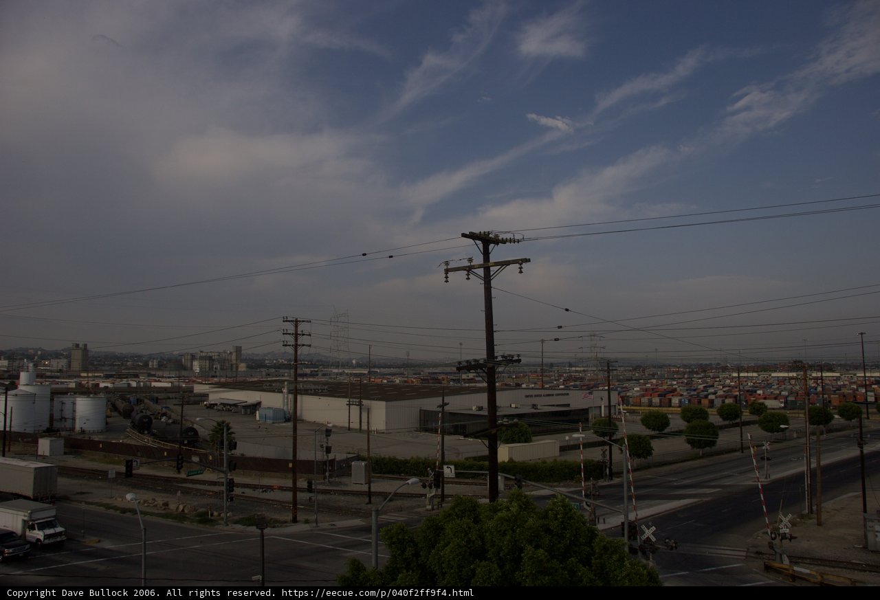 Cityscape with Power Lines and Blue Sky