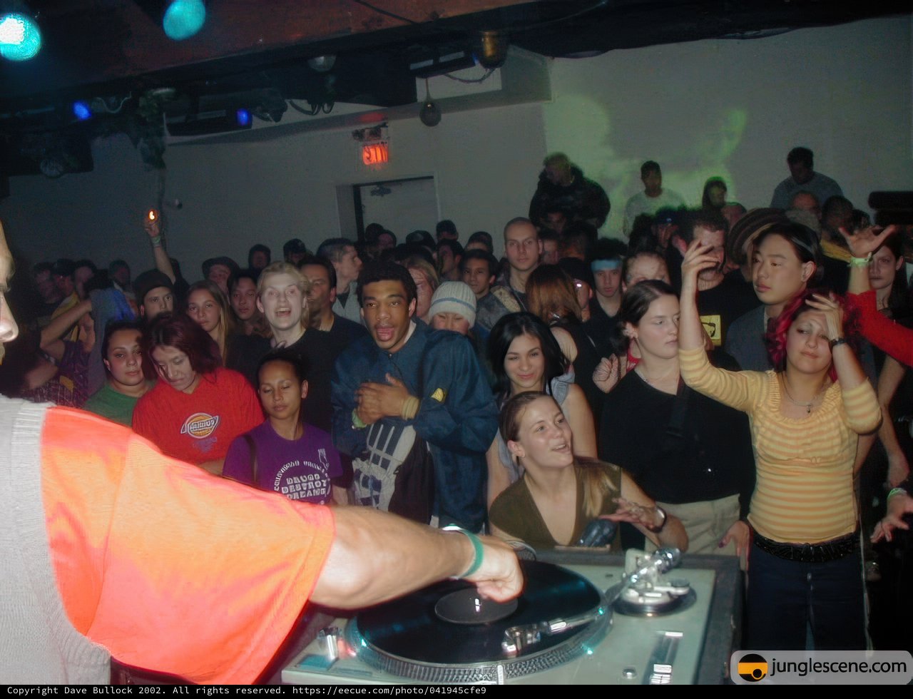 Red Shirted DJ in the Urban Disco Club