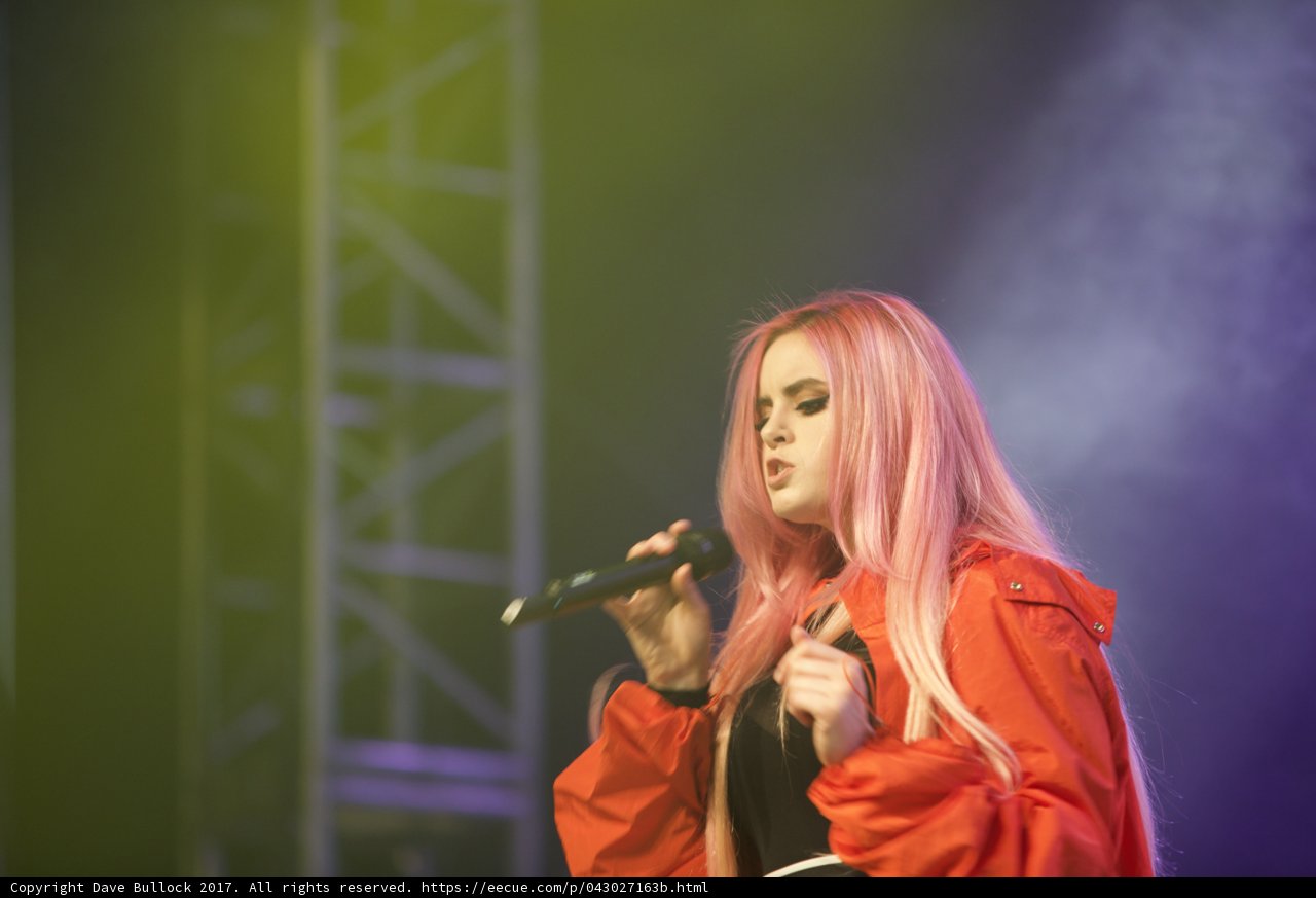 Pink-haired Singer Belts Out a Solo Performance