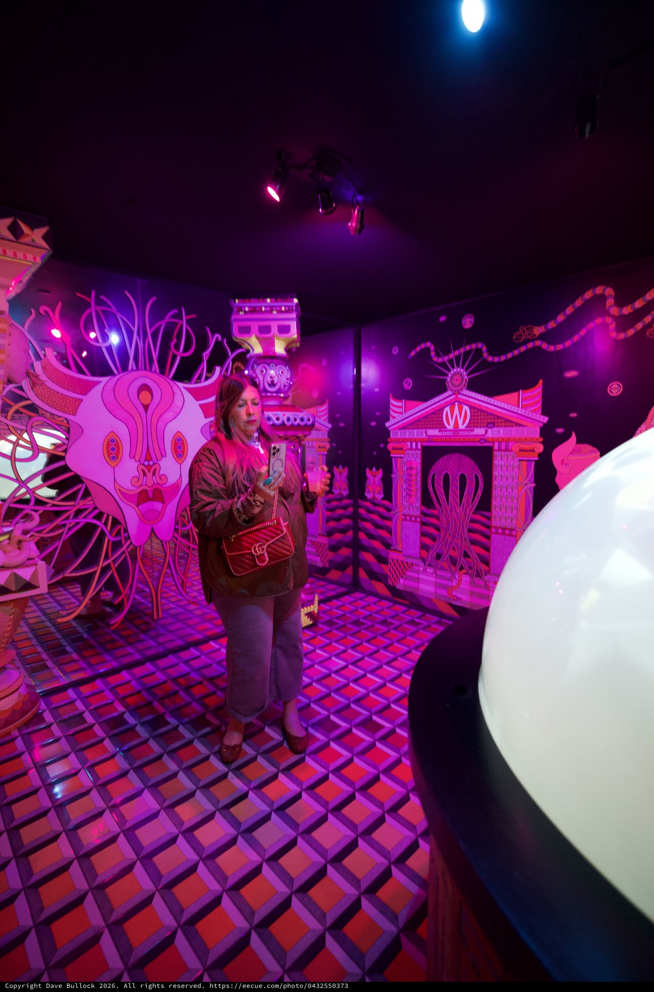 Surreal Art Installation Experience with Neon Pink Lighting