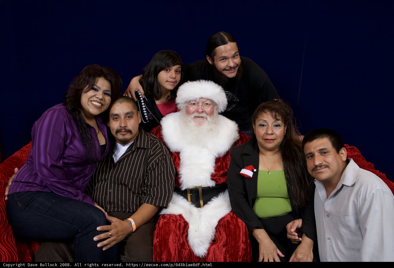 Festive Group Photo with Santa Claus