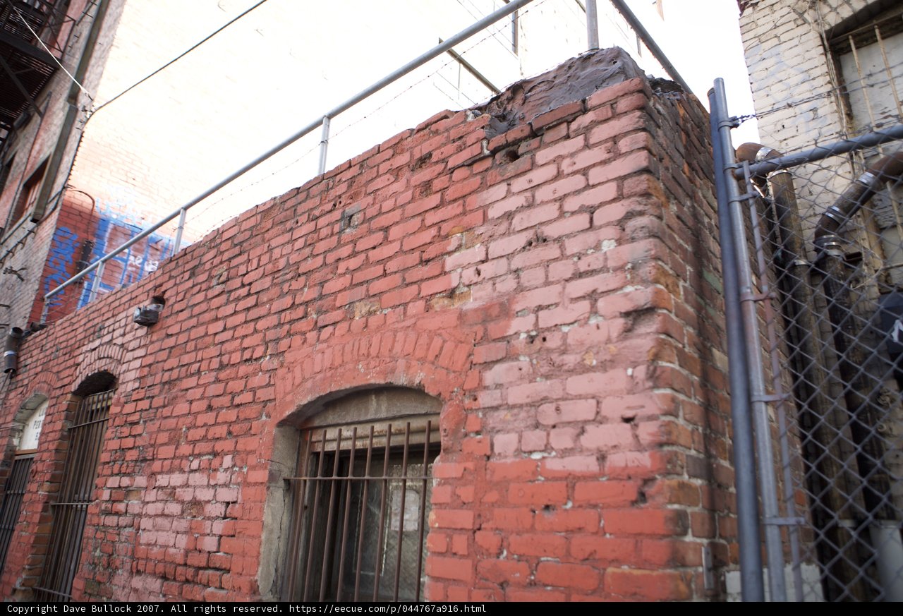 Brick Building with Fence and Gate