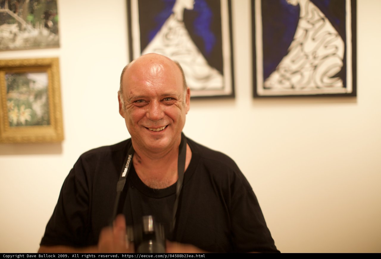 A Happy Visitor Admiring Art