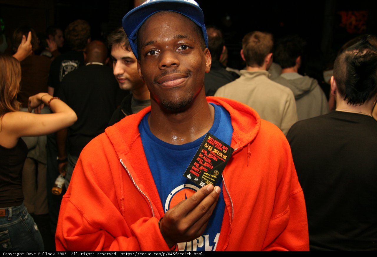 Blue-Hooded Man in a Crowd