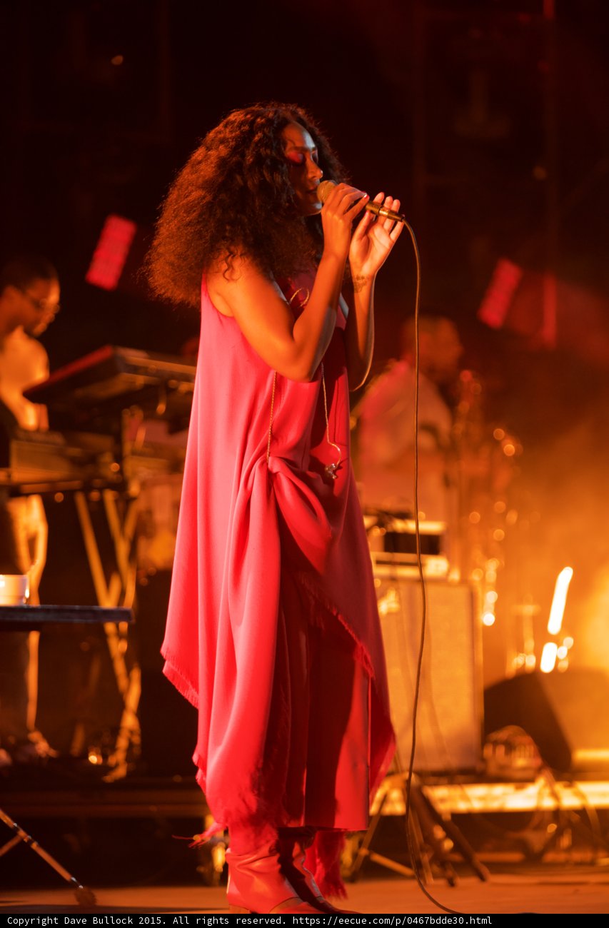 Solange Full Body Standing Profile Red Outfit Band Orange